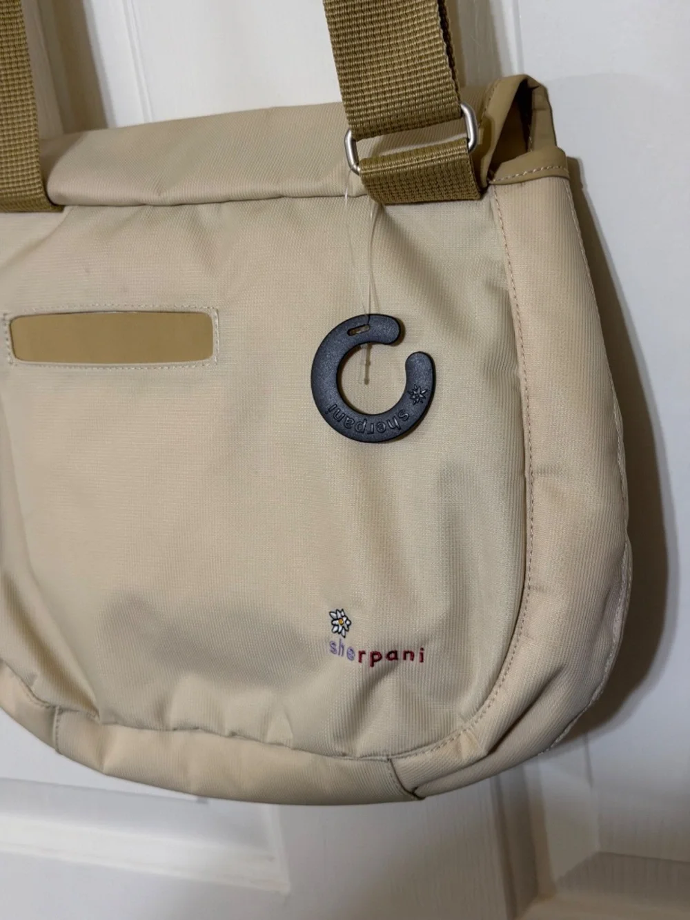 NWT Sherpani Mille Beige Crossbody Bag Lined Zip Pockets and Adjustable Strap